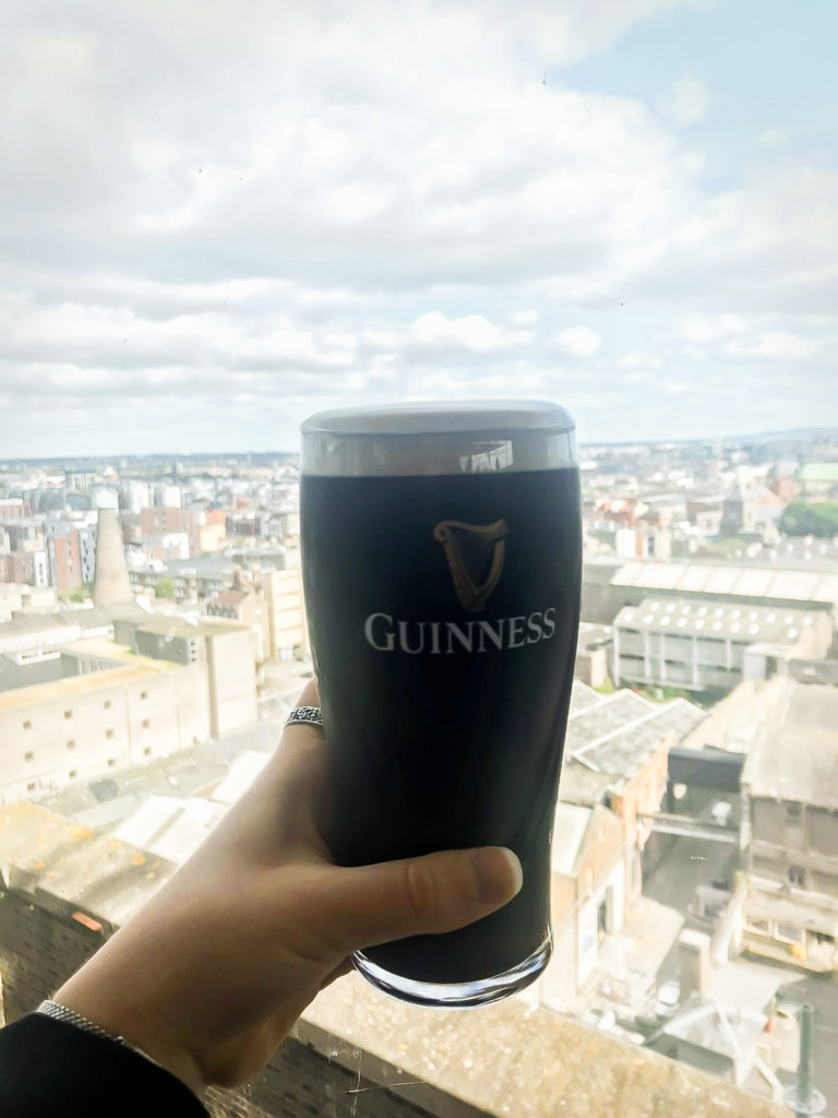 Having a pint of Guinness while overlooking Dublin at Gravity Bar